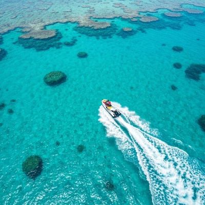 Jet ski speeding across clear blue water in Australia
